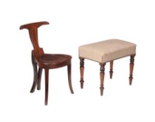 A George IV mahogany and later upholstered stool