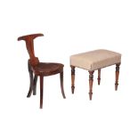 A George IV mahogany and later upholstered stool