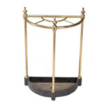 An Edwardian gilt brass and painted cast metal stick stand