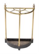 An Edwardian gilt brass and painted cast metal stick stand