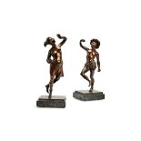 A pair of French patinated bronze models of Levantine dancers