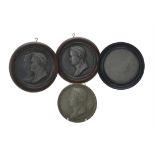 A pair of French lead portrait roundels of Napoleon