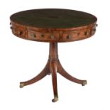 A George III mahogany drum library table