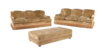 A pair of three seater sofas