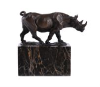 A patinated bronze model of a white rhinoceros