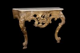A companion pair of giltwood console tables
