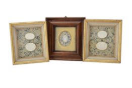 A pair of framed sets of plaster intaglios after the Antique