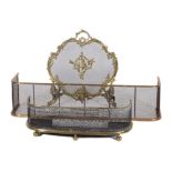 A French gilt metal and mesh firescreen in Rococo Revival style