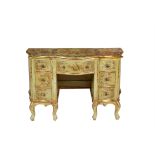 A polychrome painted and parcel gilt desk, bureau or dressing table