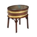 A George III mahogany and brass bound wine cooler