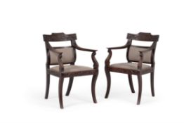 A set of six Anglo-Indian hardwood arm chairs