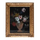 A giltwood and composition framed reverse painted glass picture of a vase of flowers