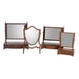 A group of four various dressing table mirrors