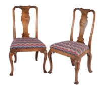 A pair of walnut side chairs