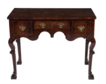 A red walnut side table in late 17th century style