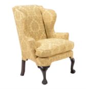 A George II mahogany and damask style upholstered armchair