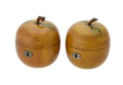 A pair of fruitwood and polychrome painted tea caddies in mid 19th century style