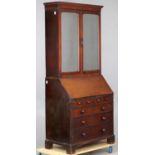 An early George III mahogany bureau bookcase