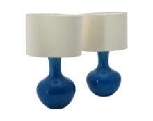 A pair of modern Chinese turquoise lamp bases with shades