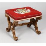 A Victorian walnut dressing stool