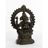 An Indian bronze group of Ganesh