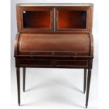 A late 19th century French mahogany cylinder bureau