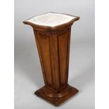 A late 19th century French marble top pedestal