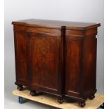 An early Victorian mahogany breakfront small side cabinet