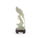 A Chinese celadon jade model of a pheasant