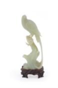 A Chinese celadon jade model of a pheasant
