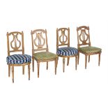 Two pairs of lyre back giltwood chairs