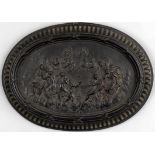 A black basalt plaque depicting the 'Feast of the Gods'