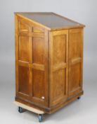 A late Victorian oak museum display and collections cabinet