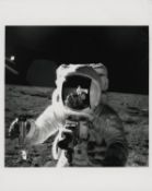 Alan Bean with the reflection of the photographer in his visor, Apollo 12, November 1969, EVA 2