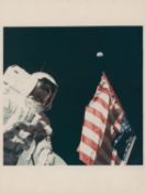 Harrison Schmitt with the Earth above the American flag, Apollo 17, December 1972, EVA 1