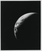Full crescent Earth, taken by a camera aboard the first Saturn V rocket, Apollo 4, November 1967