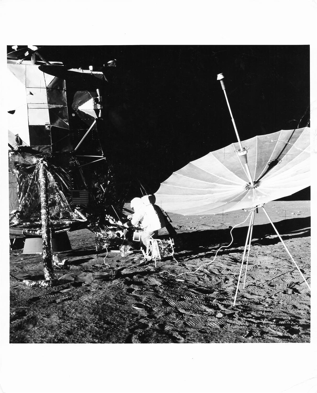 Deployment of scientific experiments on the lunar surface [three images], Apollo 12, November 1969 - Image 3 of 7