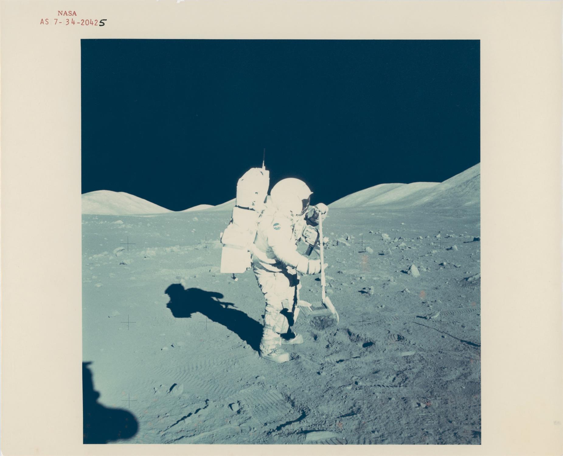 Lunar scenes: Harrison Schmitt working with the rake and at the SEP site, Apollo 17, December 1972 - Image 2 of 5