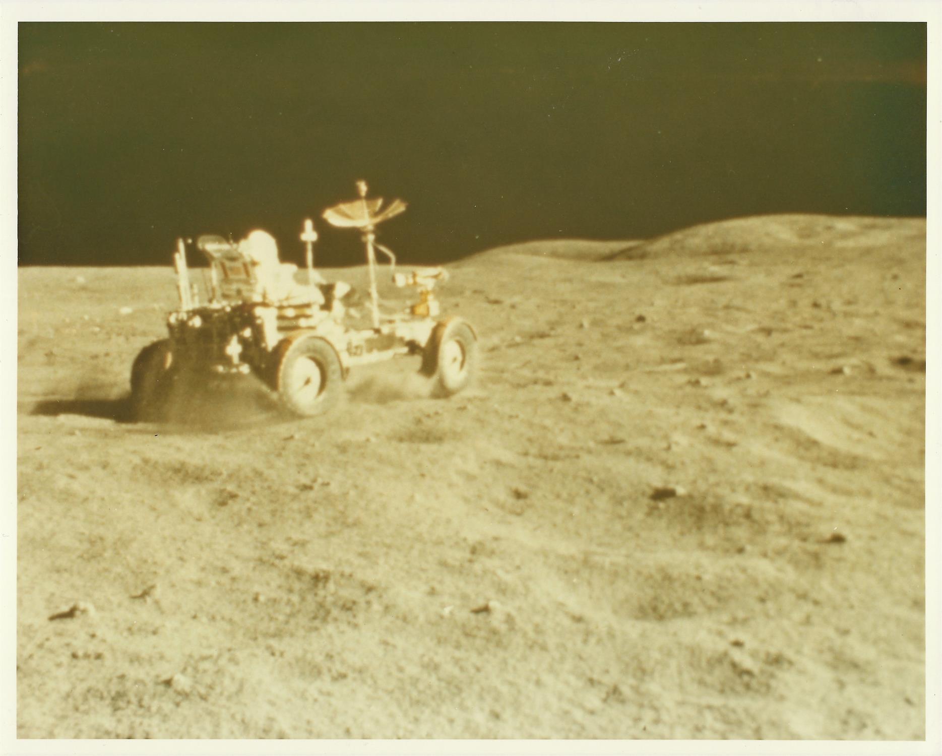 Lunar Rover getting a speed work out by John Young, Apollo 16, April 1972