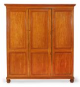 A Victorian satinwood compactum wardrobe