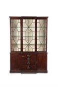 A George III mahogany breakfront library bookcase