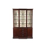 A George III mahogany breakfront library bookcase