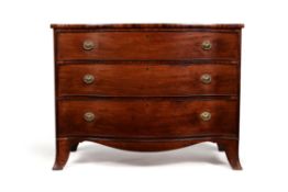 A George III mahogany serpentine fronted chest of drawers