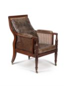 A Regency mahogany bergere library armchair