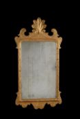 A George I gilt gesso wall mirror