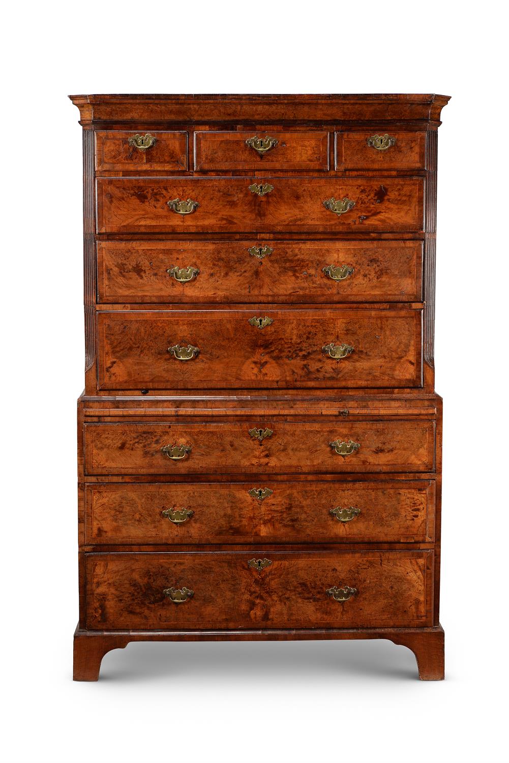 A George II burr walnut and feather banded chest on chest