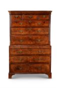 A George II burr walnut and feather banded chest on chest