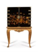 A black lacquer and gilt chinoiserie decorated cabinet