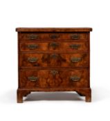 A George II figured walnut and feathered bachelor's chest