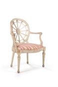 A George III cream painted and parcel gilt open armchair